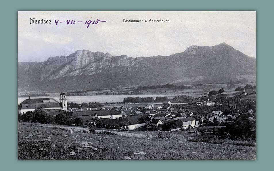 034_Mondsee.-Totalansicht-v.-Gasterbauer-Photobrom-ges.-gesch.-1906-No-7-gelaufen-1910